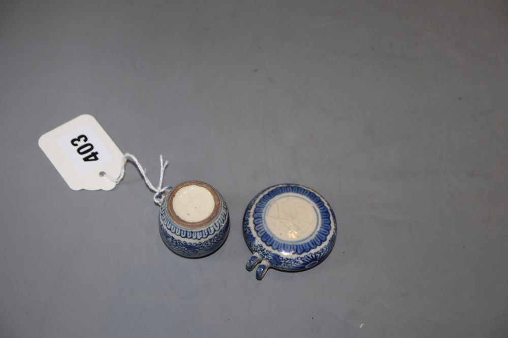 Two Chinese blue and white bird feeders, largest diameter 5cm